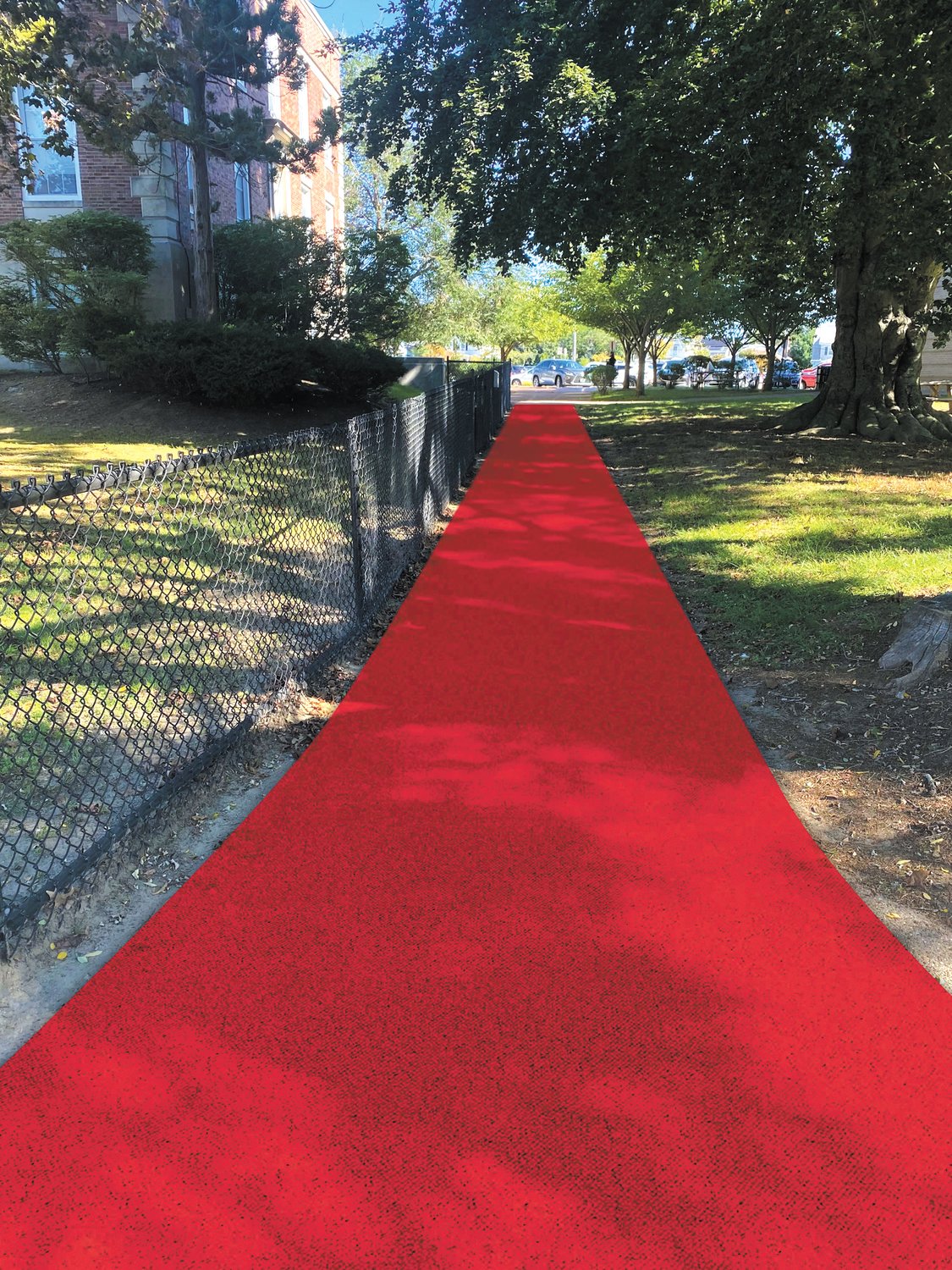 WALKING THE RED CARPET: The city will repurpose the street lights from Knightsville and put them along the walkway between City Hall and the Cranston Public Schools District building. The hops is to also install synthetic turf along the pathway to imitate a red carpet which individuals can use to get to the Park Theatre – it also connects individuals to Rolfe Square.